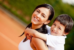 Mother and son at the tennis court